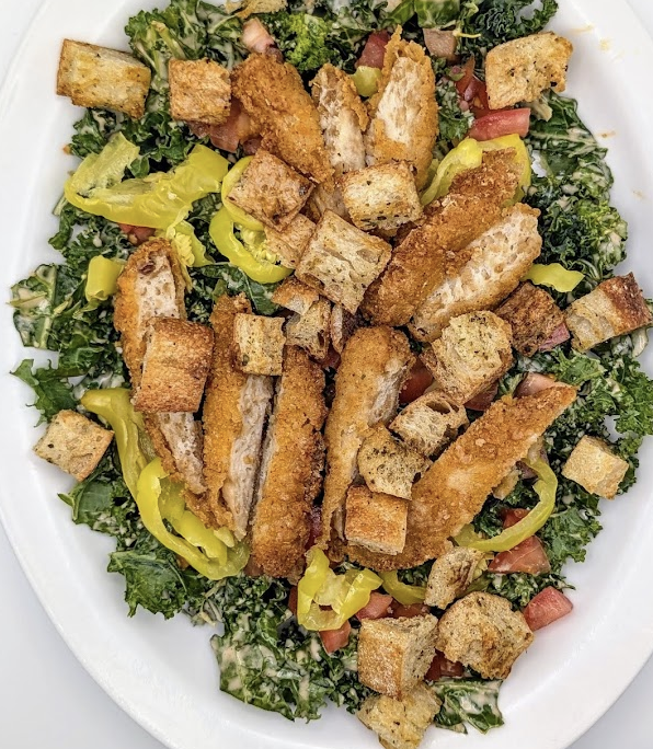 Strong Hearts signature dishes Southwest Chicken SaladSweet Sassy MolassyBBQ Tempeh Sandwich
